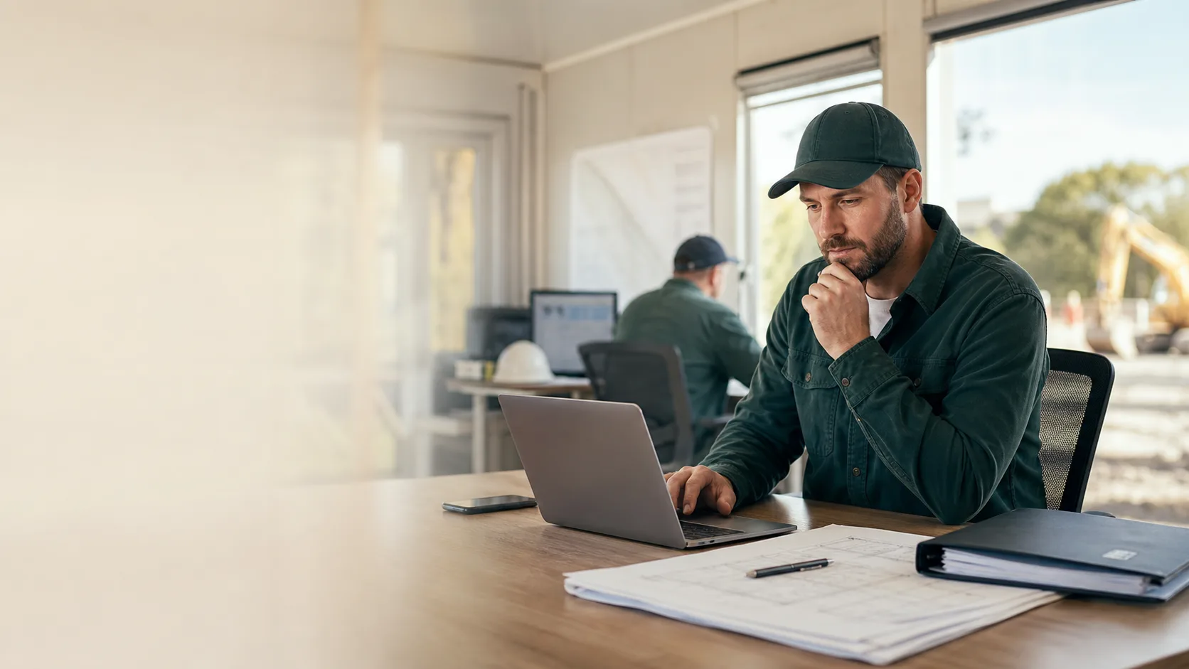 Construction operations lead reviewing an approval package